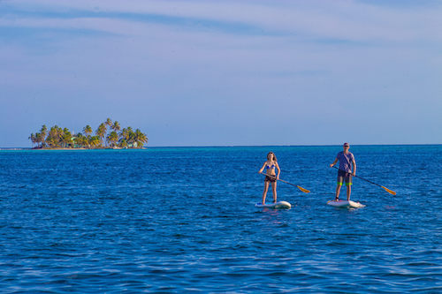 Paddling on the Coral Islands SUP Trip