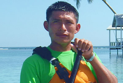 Mayan sea kayak and snorkel guide on the Belize Barrier reef near Southwater caye 