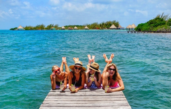 girls enjoying the ocean in Belize
